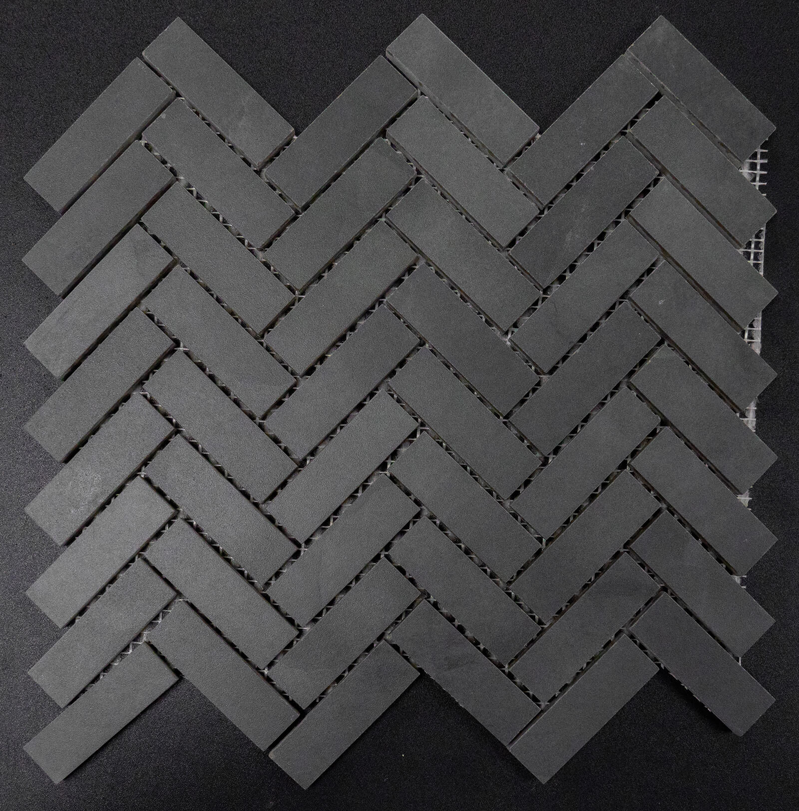 1x3 Celestra Umbra Herringbone Matte